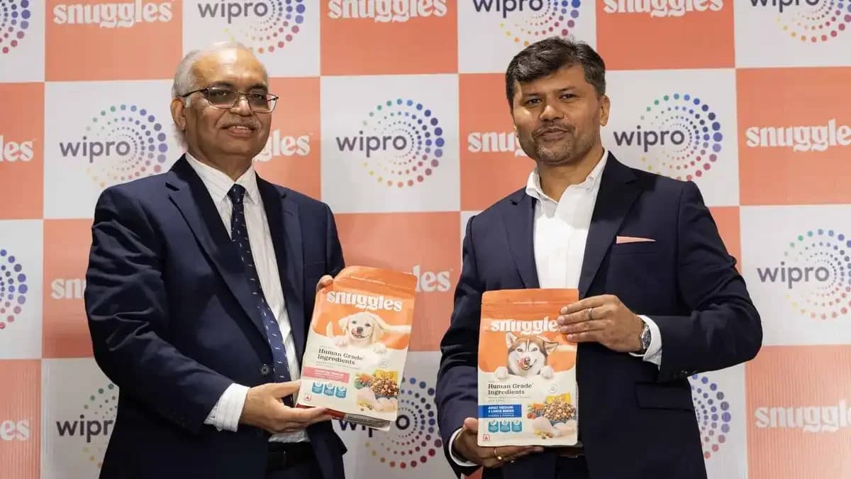 Wipro Consumer executives unveil Snuggles premium dog food at the brand launch event in August 2026.