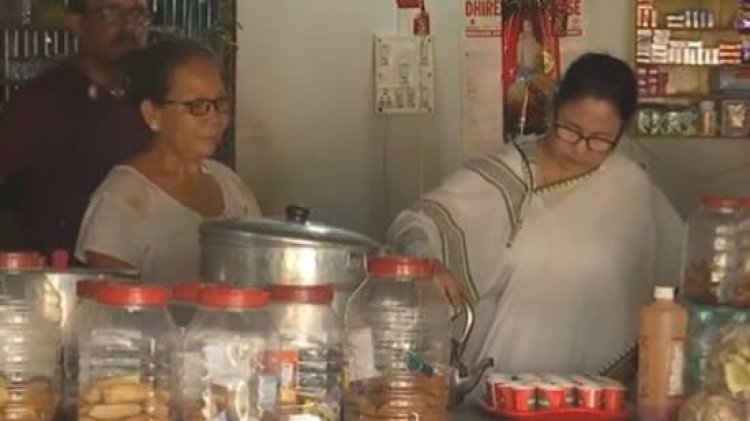 Mamata Banerjee, West Bengal's Chief Minister, serves tea and connects with the people during panchayat elections campaign